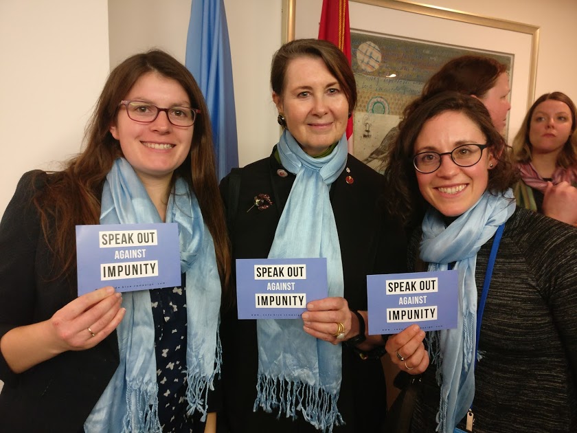 Catherine Dunmore, LLM candidate at the University of Toronto’s Faculty of Law, takes a photo with Senator Marilou McPhedran (centre) and Code Blue Coordinator Kaila Mintz (right) for Code Blue’s scarf initiative. Photograph courtesy of the Code Blue Campaign. 