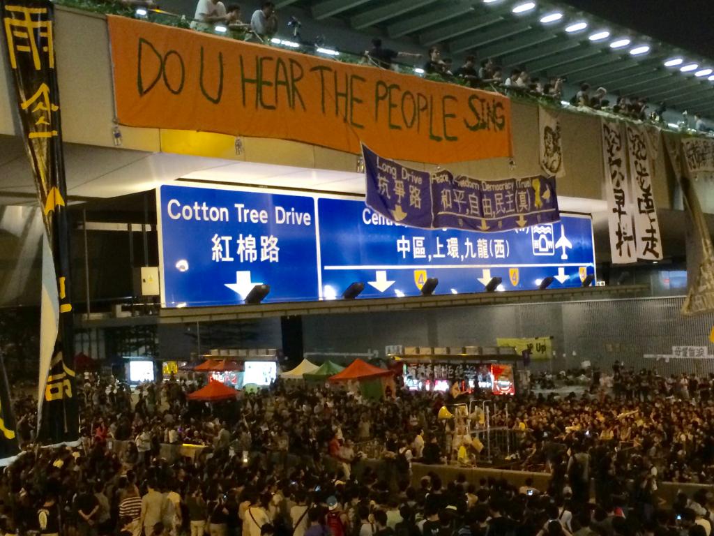 Protesters and banners during Occupy Central in Hong Kong’s Admiralty district. Photography by Karlson Leung.