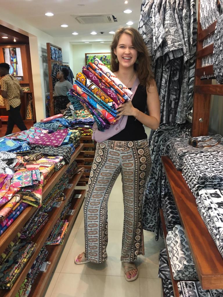 IHRP Summer Fellow Michelle LaFortune at a fabric store in Ghana.